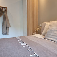 Taupe bruin Sprei Wafel op bed 